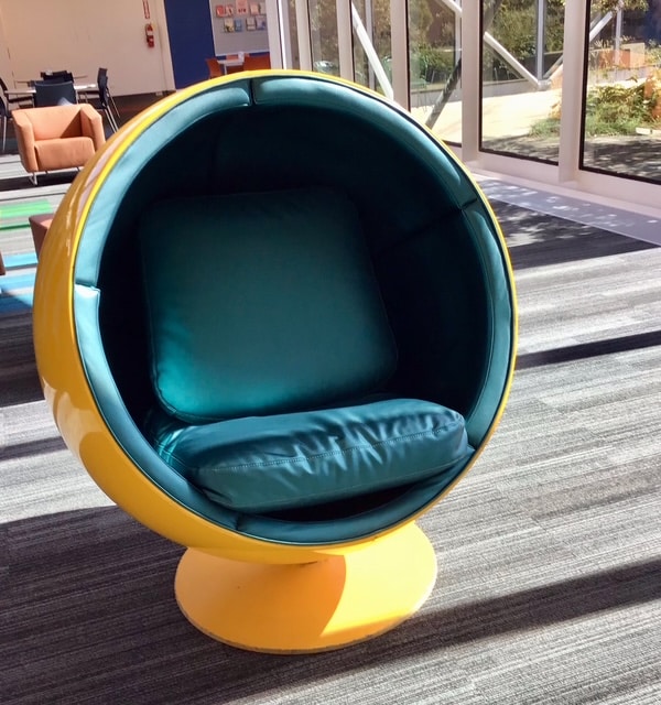 Moon chair in reading area